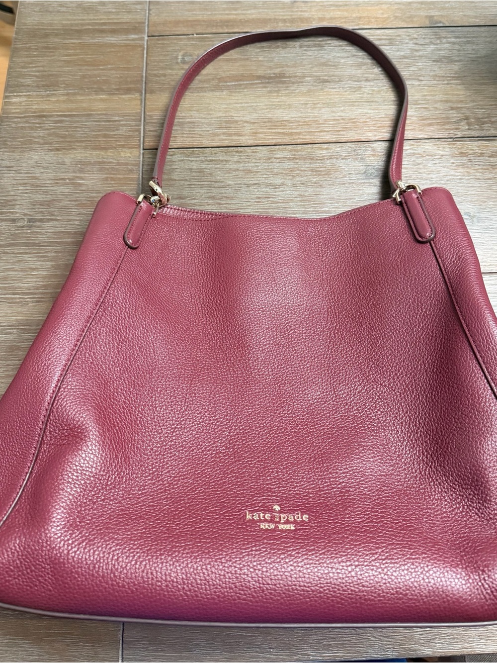 Excellent used condition Kate Spade Burgundy Leather Shoulder Bag.